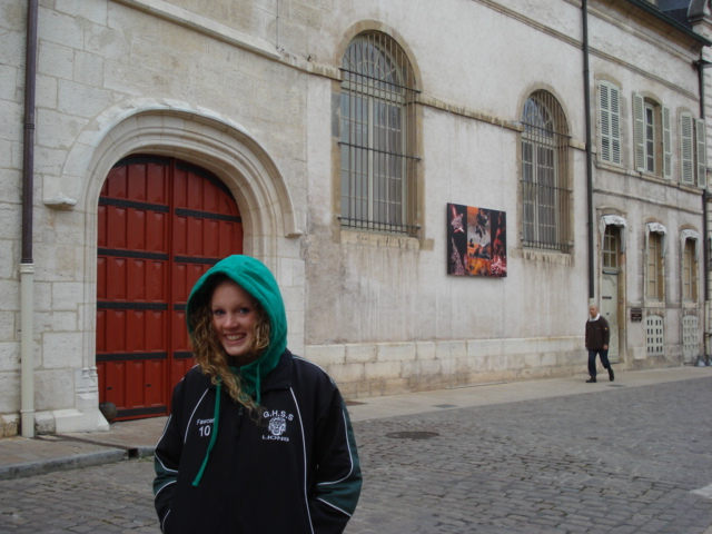 Staying warm in front of the Hospices de Beaune, France - Oct 2010